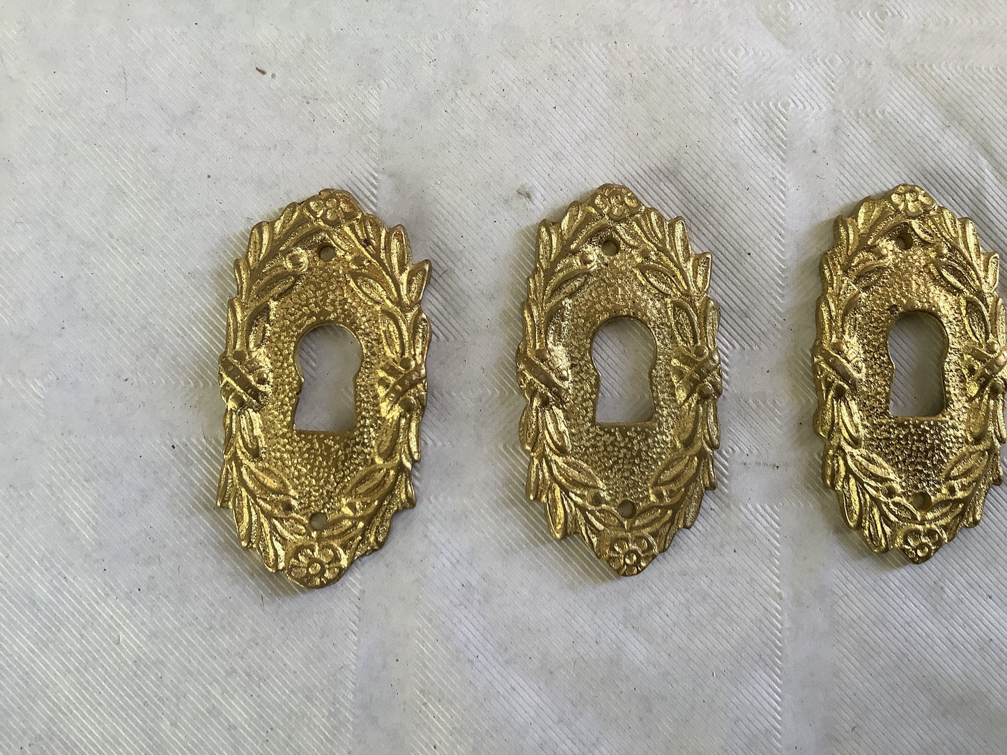 Set of three matching Antique Brass Keyhole Cover Escutcheon made in France in the 1900s elegant pieces