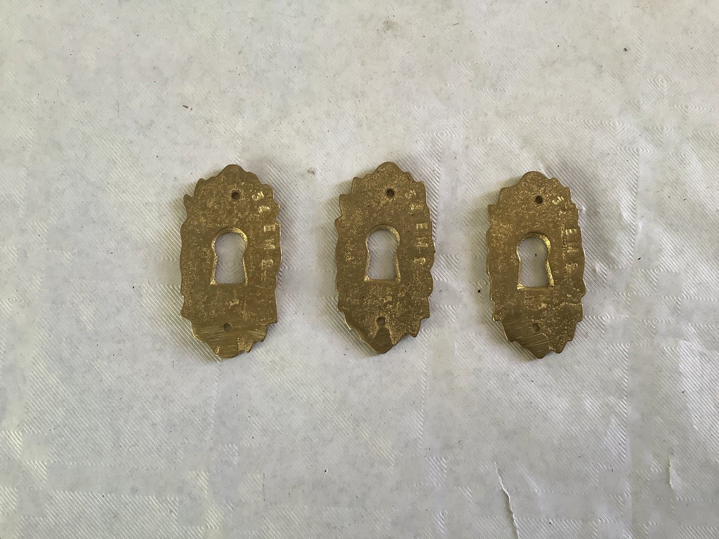 Set of three matching Antique Brass Keyhole Cover Escutcheon made in France in the 1900s elegant pieces