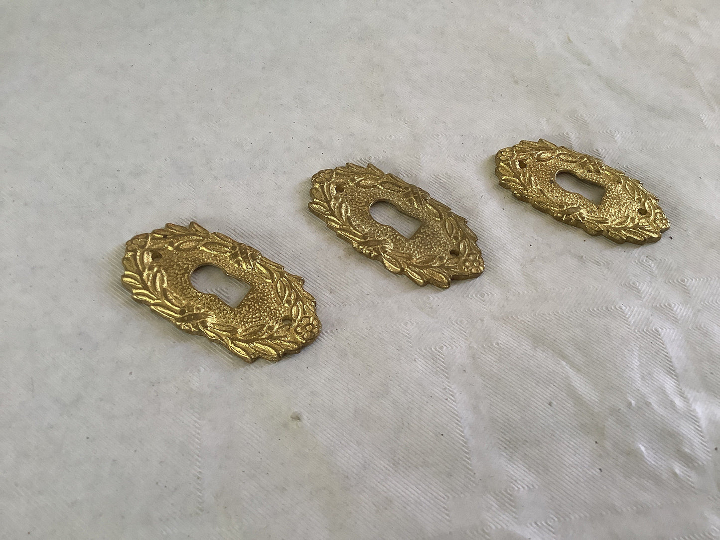 Set of three matching Antique Brass Keyhole Cover Escutcheon made in France in the 1900s elegant pieces