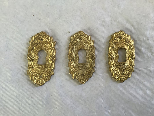 Set of three matching Antique Brass Keyhole Cover Escutcheon made in France in the 1900s elegant pieces