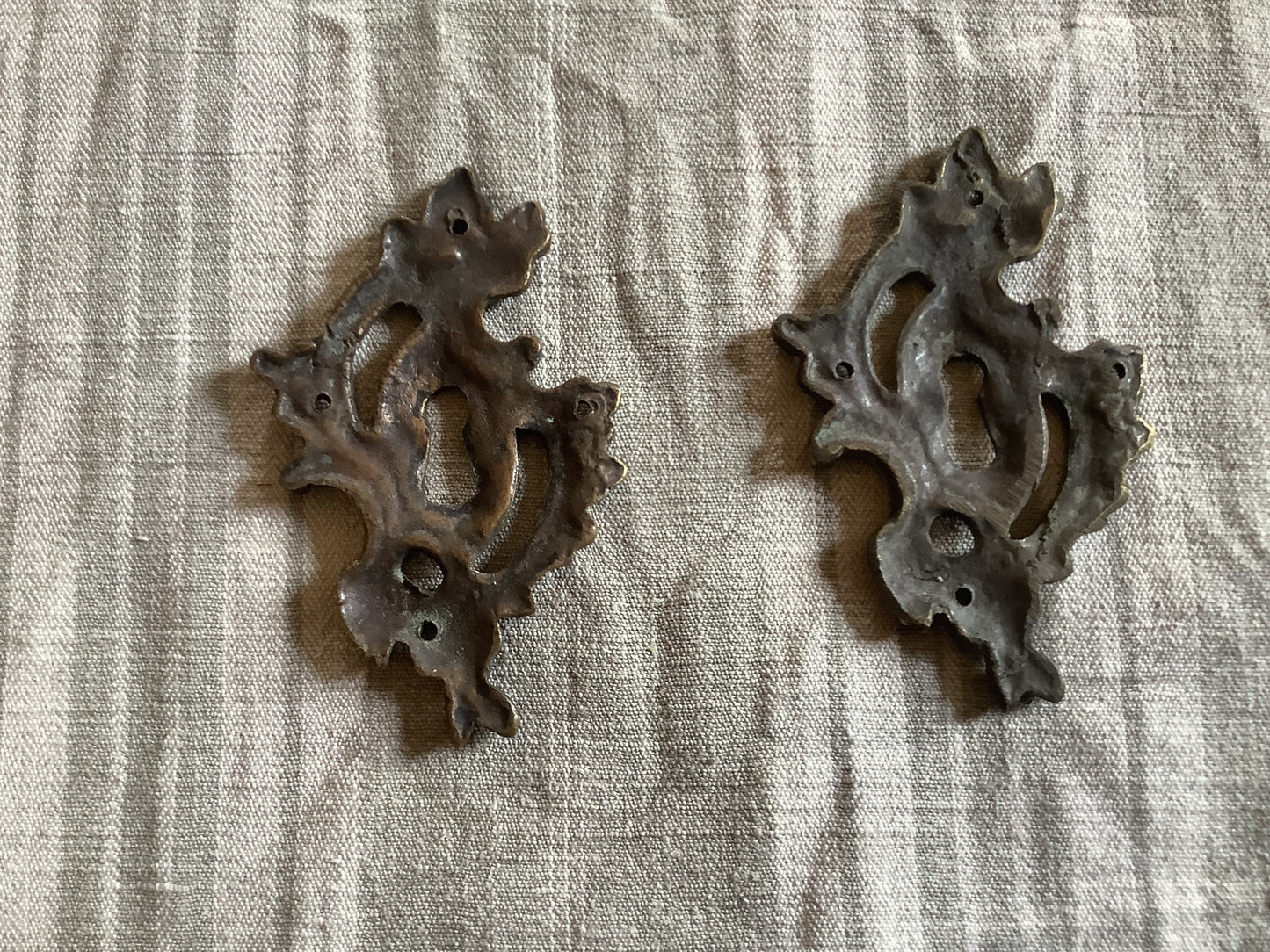 A set of Two matching Antique Brass Keyhole Cover made in France in the 1900s