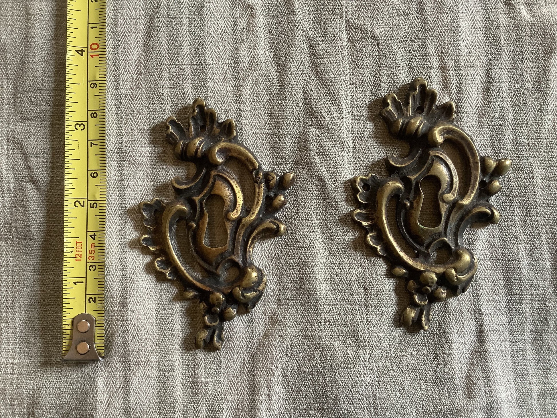 A set of Two matching Antique Brass Keyhole Cover made in France in the 1900s