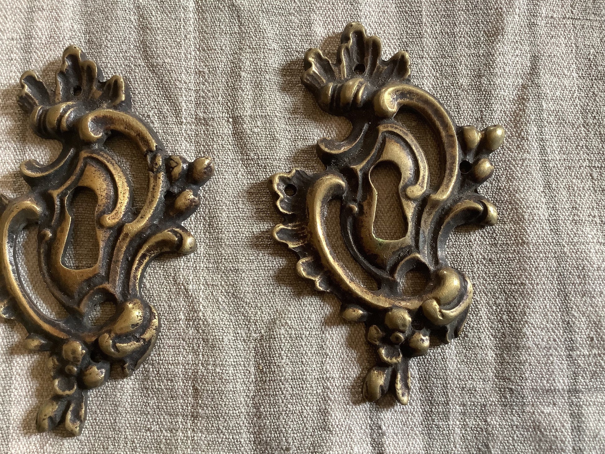 A set of Two matching Antique Brass Keyhole Cover made in France in the 1900s