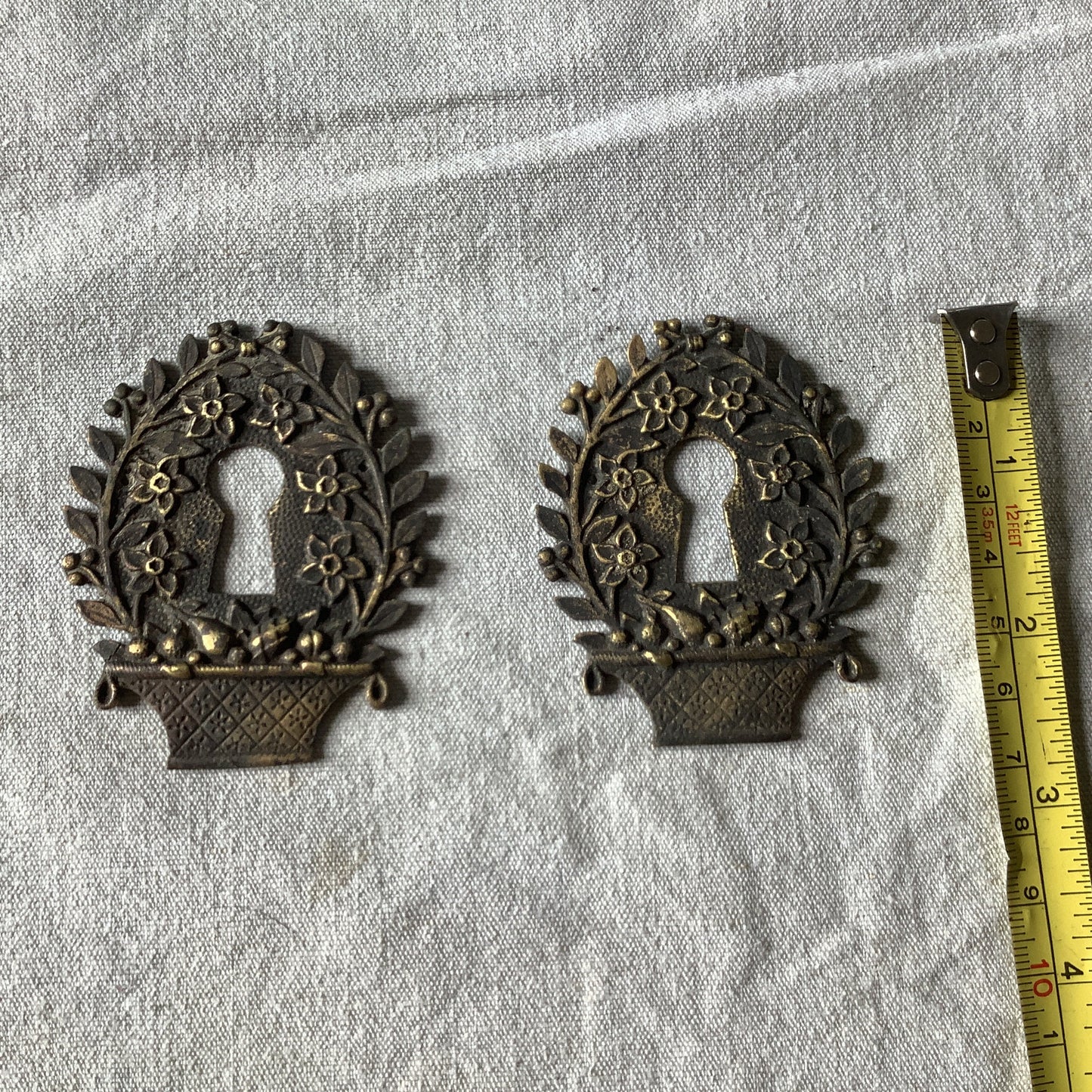 Two matching Antique Brass Keyhole Cover Escutcheon made in France in 1900s flowers in basket