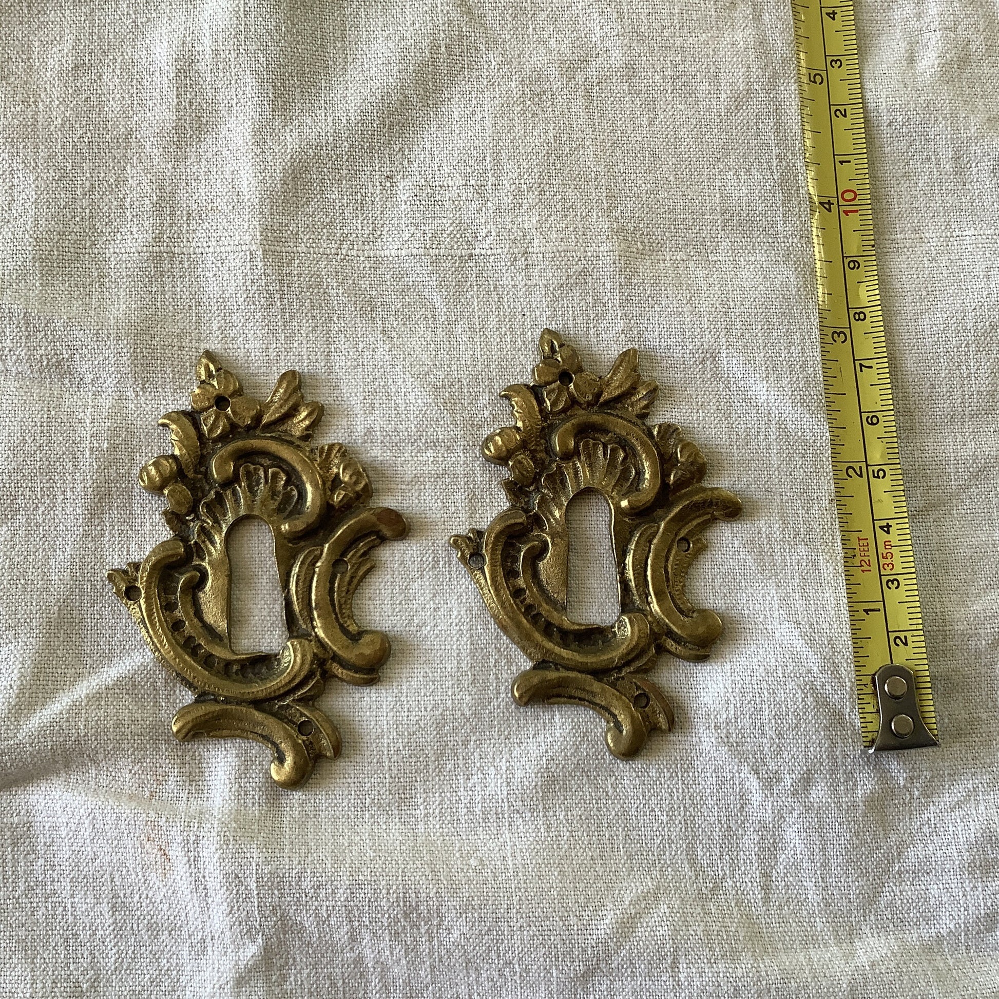 A set of Two matching Antique Brass Keyhole Cover made in France in the 1900s