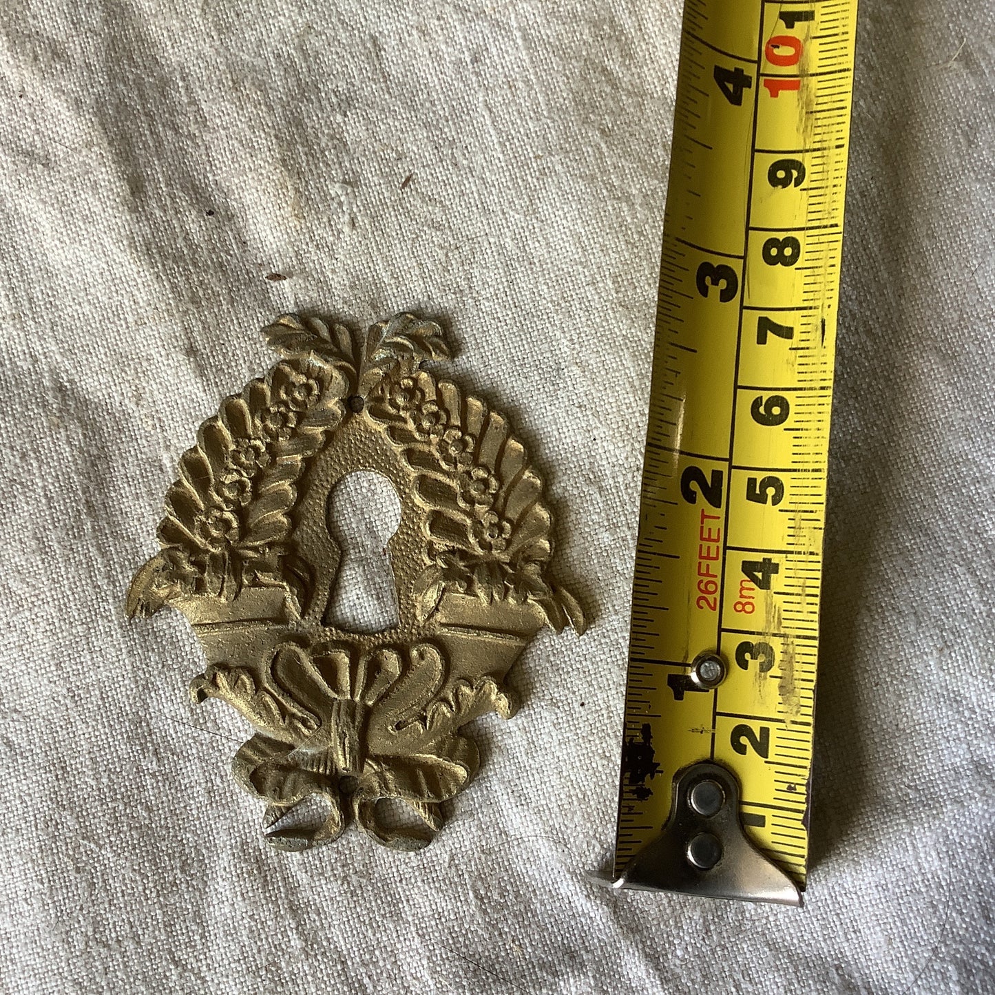 One Antique Brass Keyhole Cover made in France in the 1900s