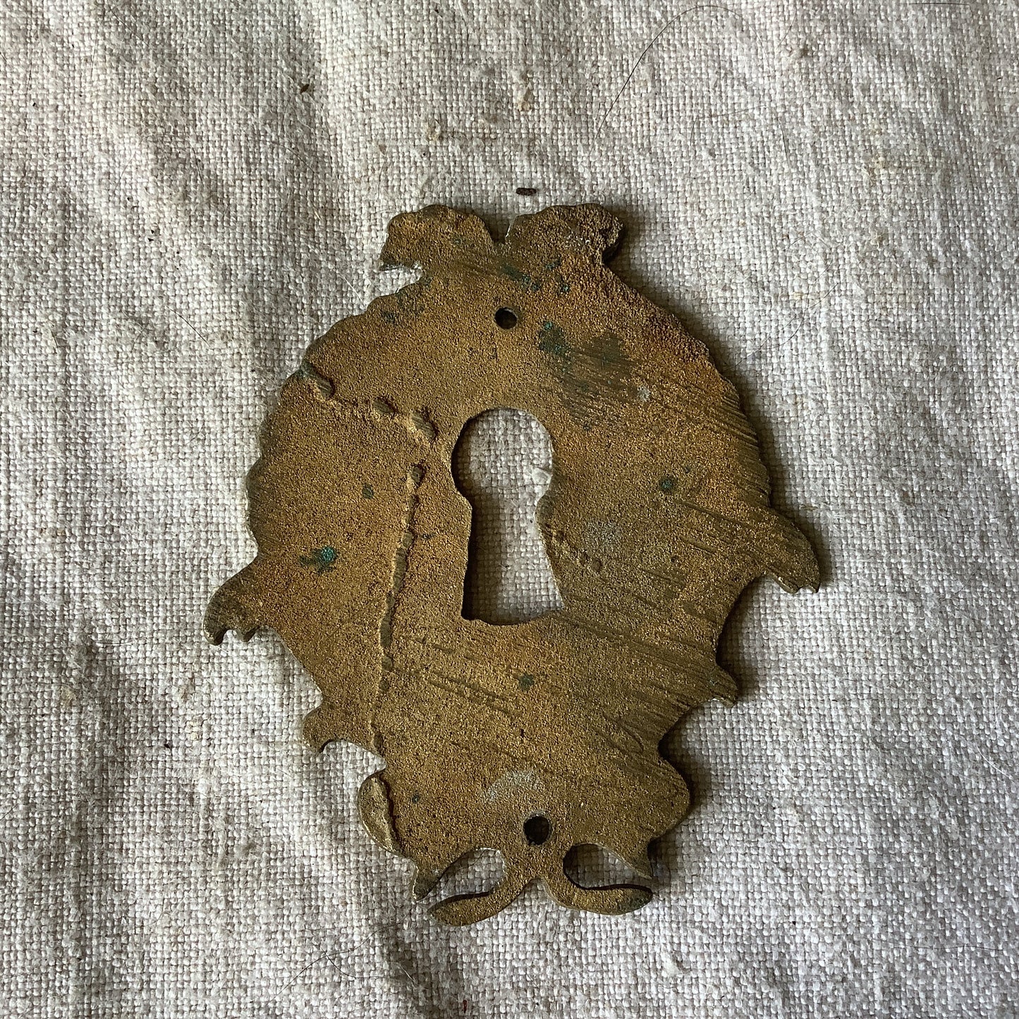 One Antique Brass Keyhole Cover made in France in the 1900s