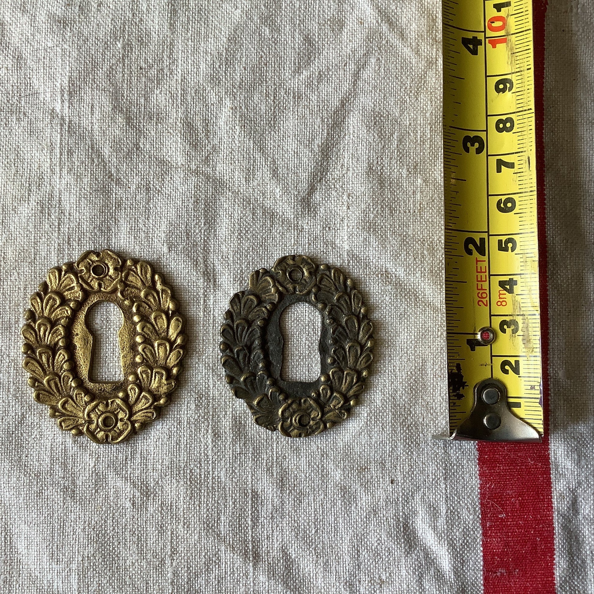 A set of Two matching Antique Brass Keyhole Cover made in France in the 1900s