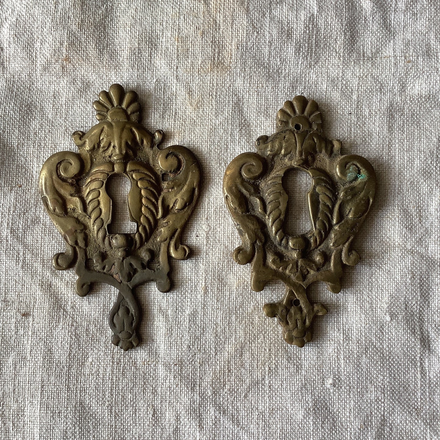 A set of Two Slightly different Antique Brass Keyhole Cover made in France in the 1900s