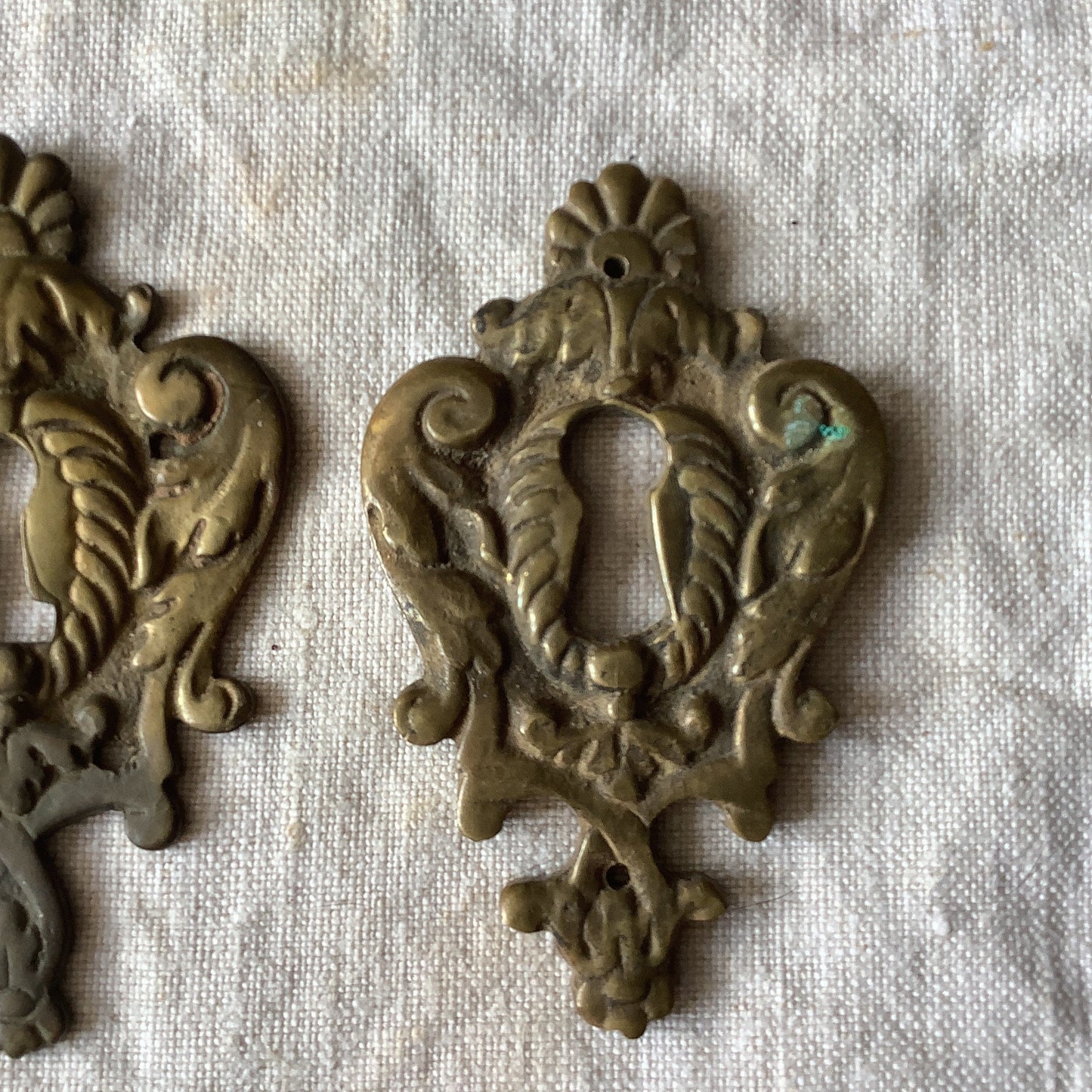 A set of Two Slightly different Antique Brass Keyhole Cover made in France in the 1900s