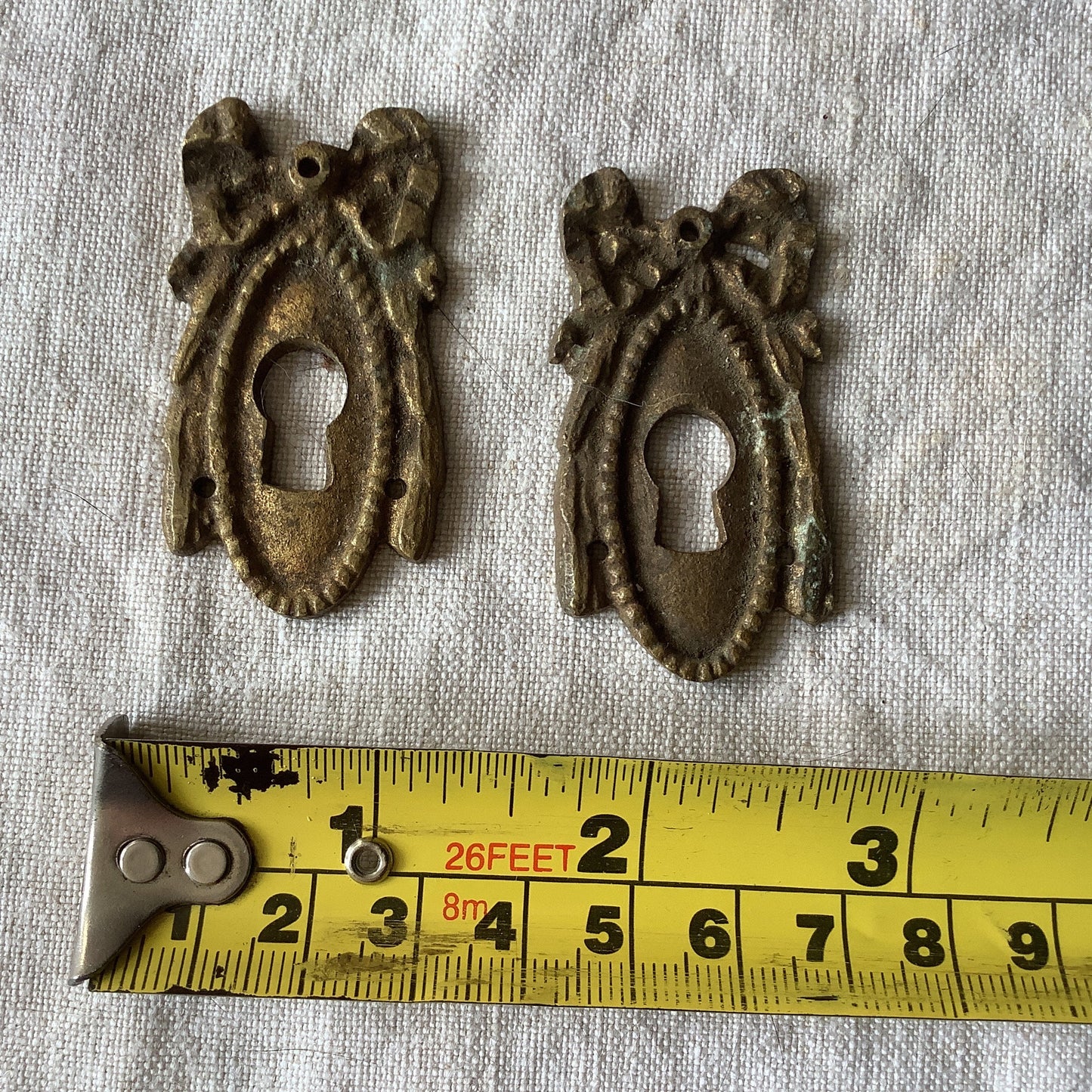 A set of Two matching Antique Brass Keyhole Cover made in France in the 1900s