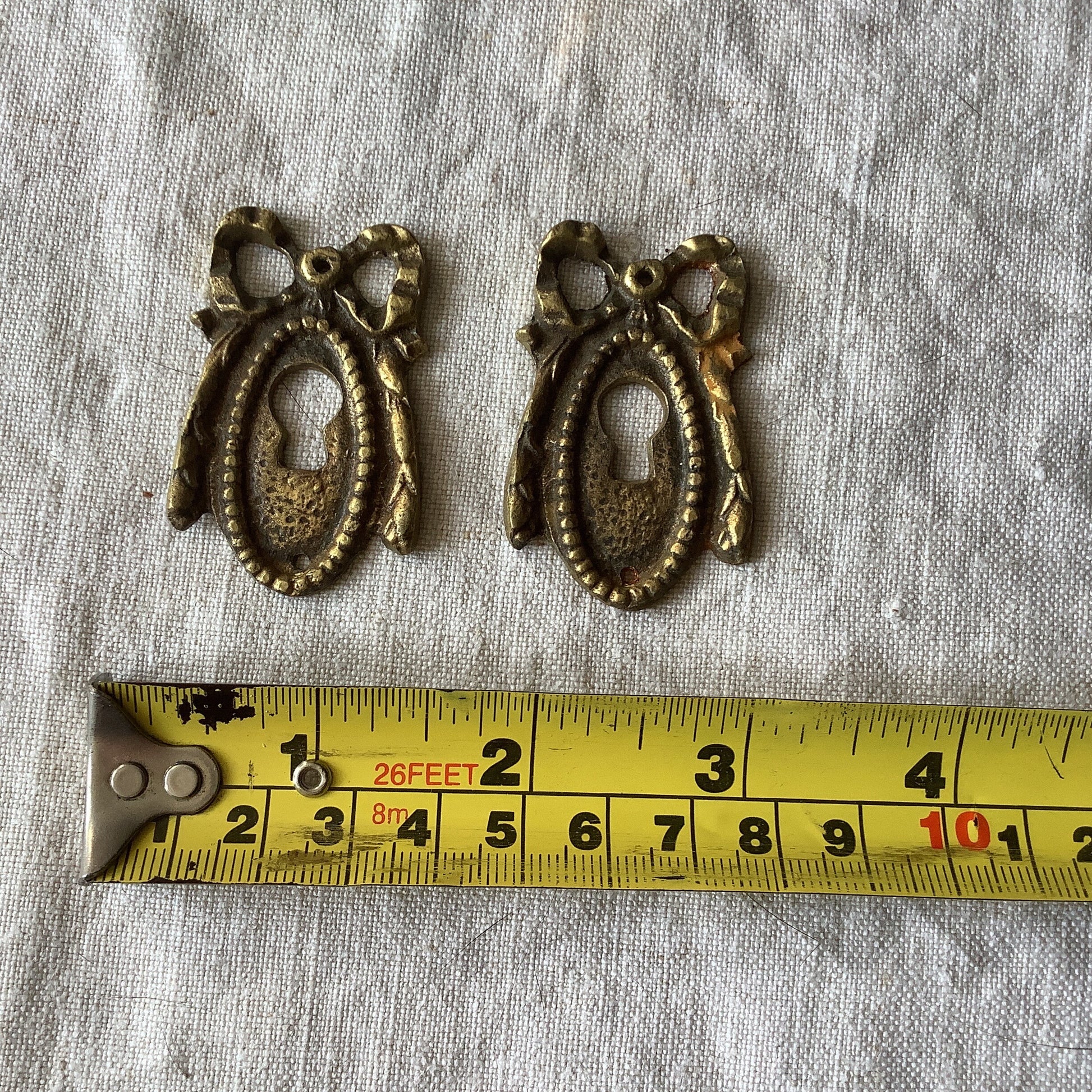 A set of Two matching Antique Brass Keyhole Cover made in France in the 1900s