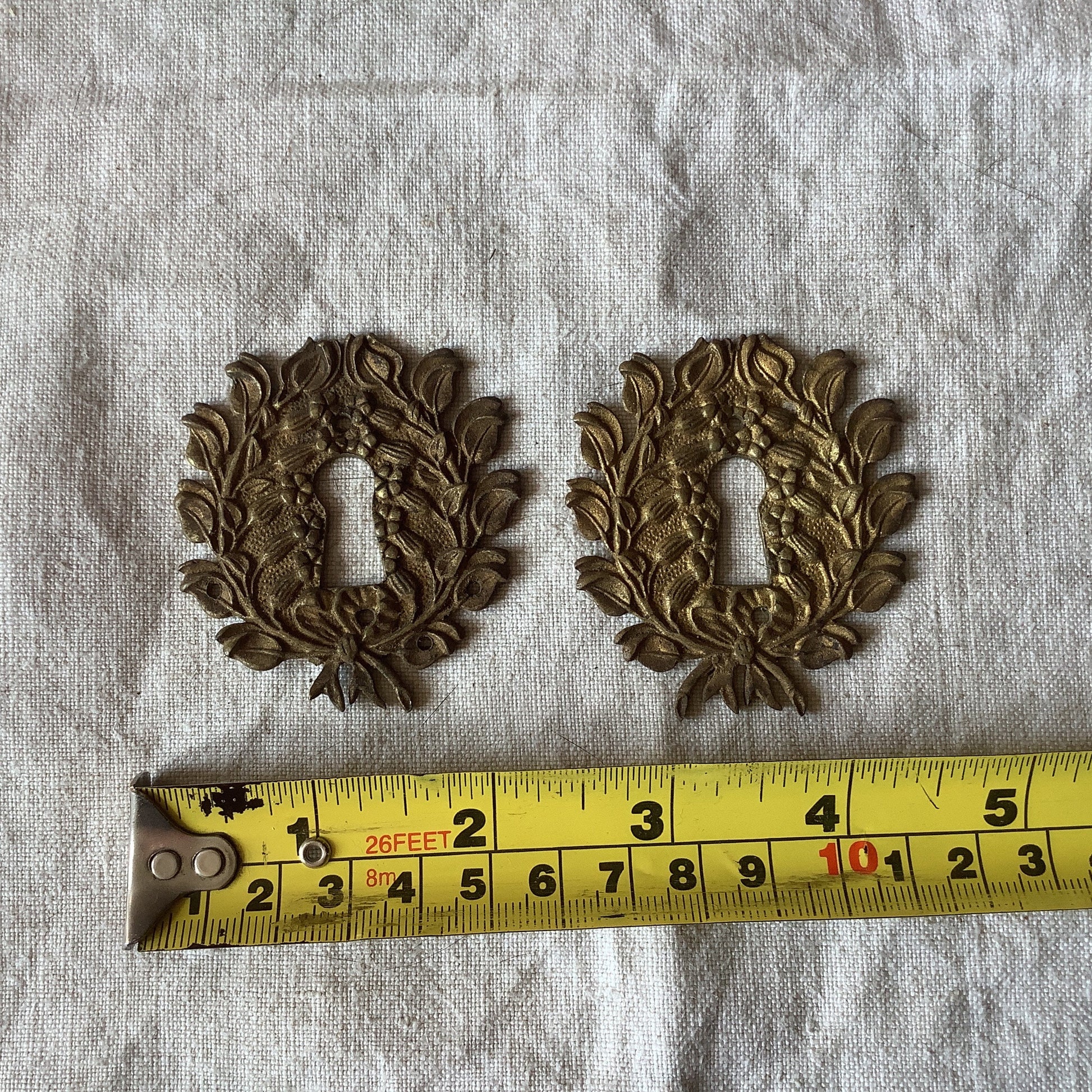 A set of Two matching Antique Brass Keyhole Cover made in France in the 1900s