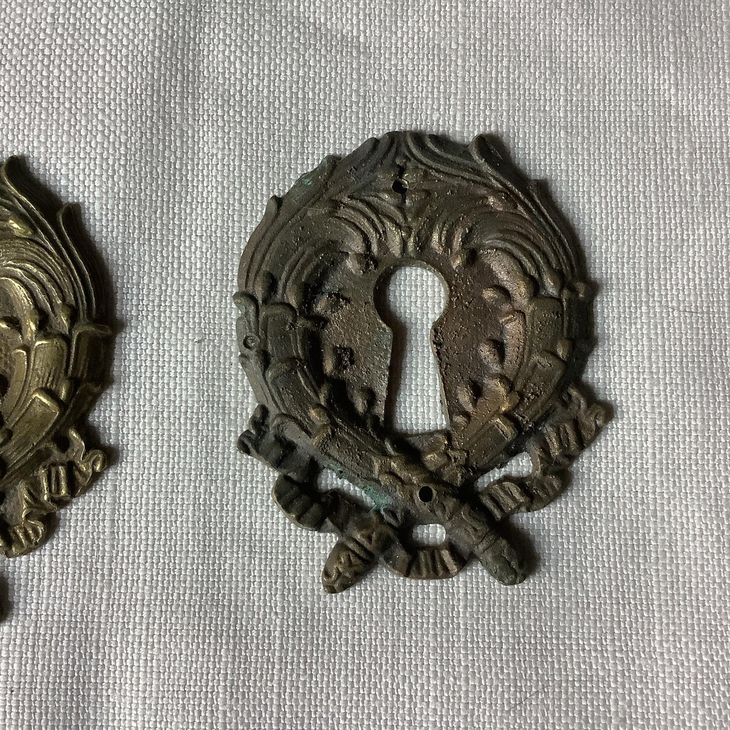 A set of Two slightly different  large  Antique Brass Keyhole Cover made in France in the 1900s