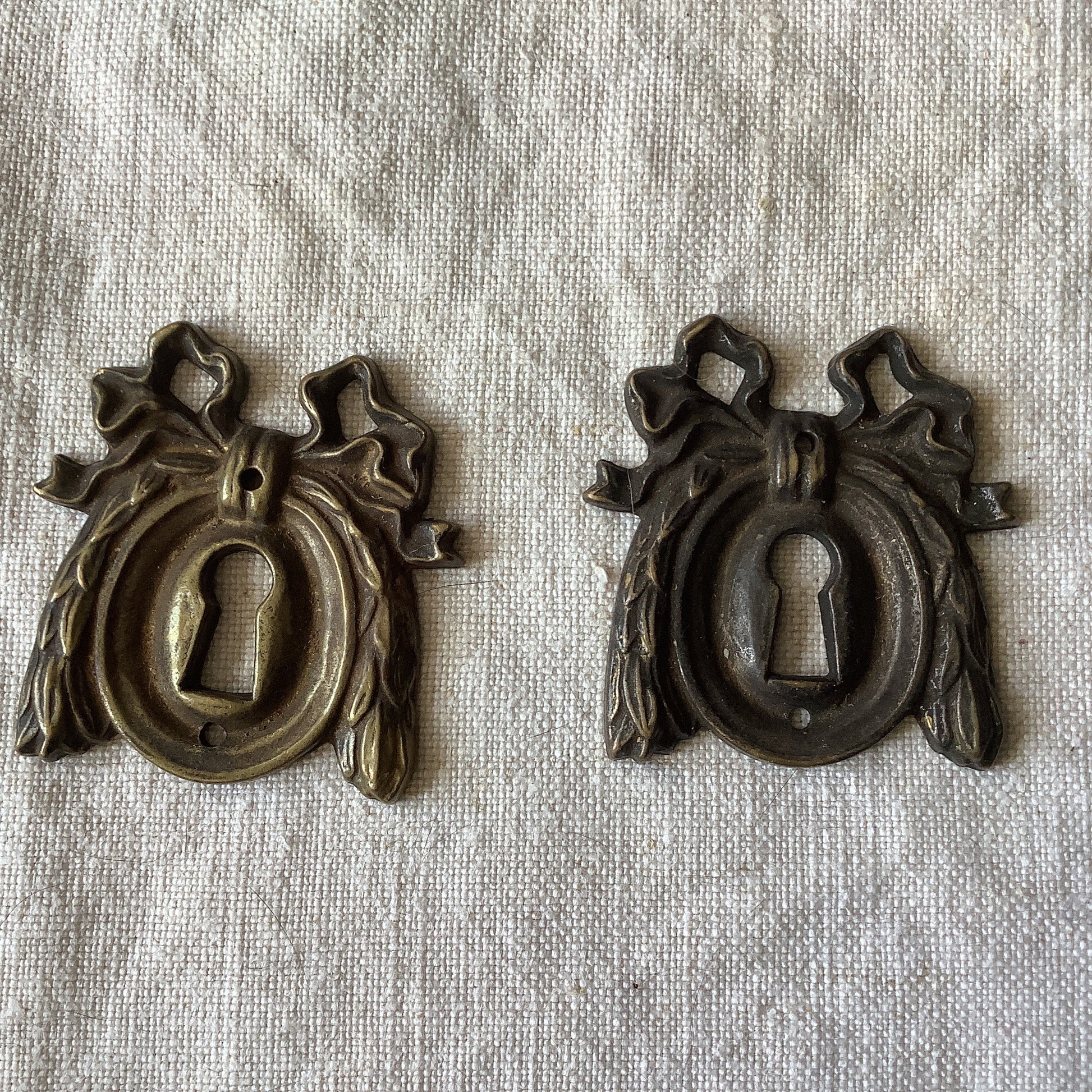 A set of Three matching Antique Brass Keyhole Cover made in France in the 1900s