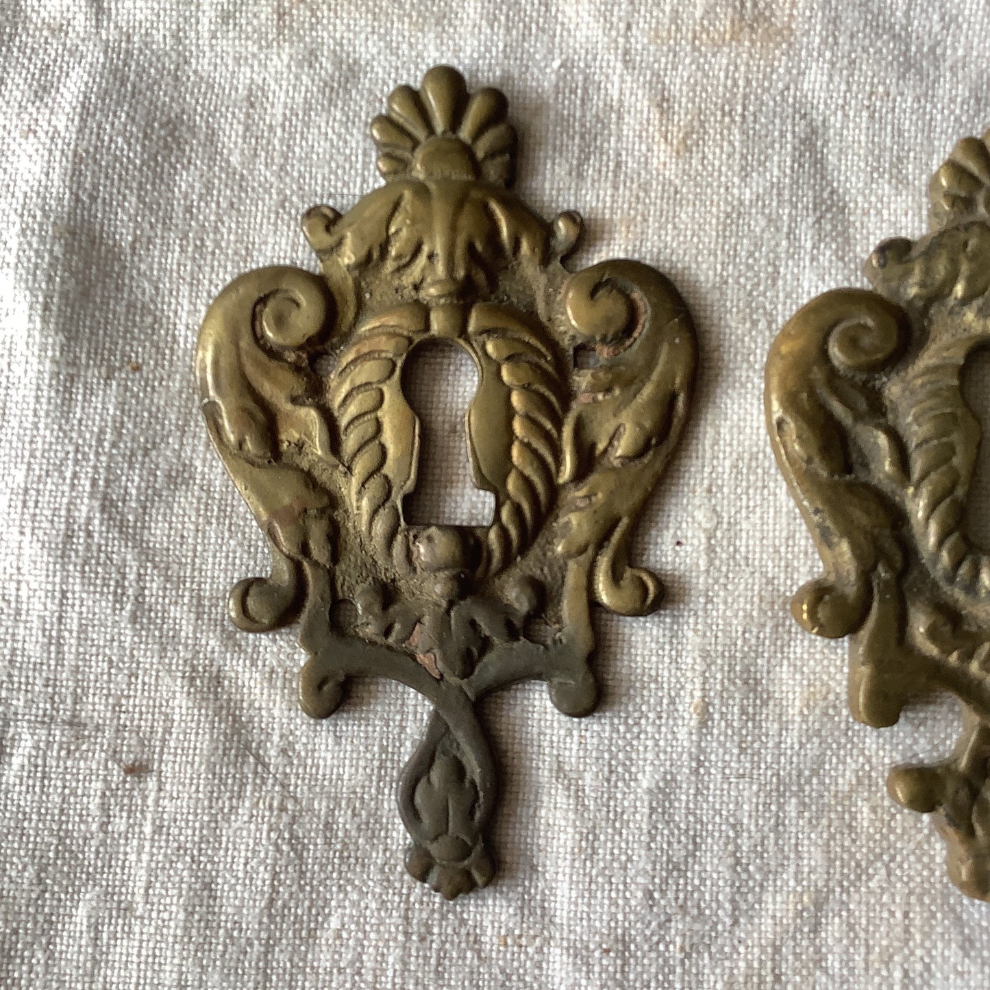 A set of Two Slightly different Antique Brass Keyhole Cover made in France in the 1900s