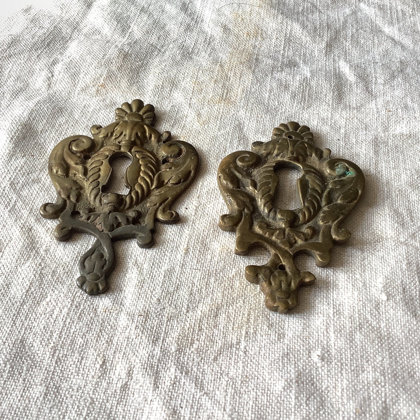 A set of Two Slightly different Antique Brass Keyhole Cover made in France in the 1900s