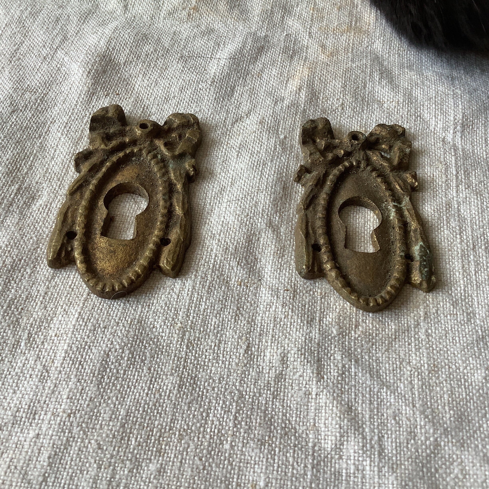 A set of Two matching Antique Brass Keyhole Cover made in France in the 1900s