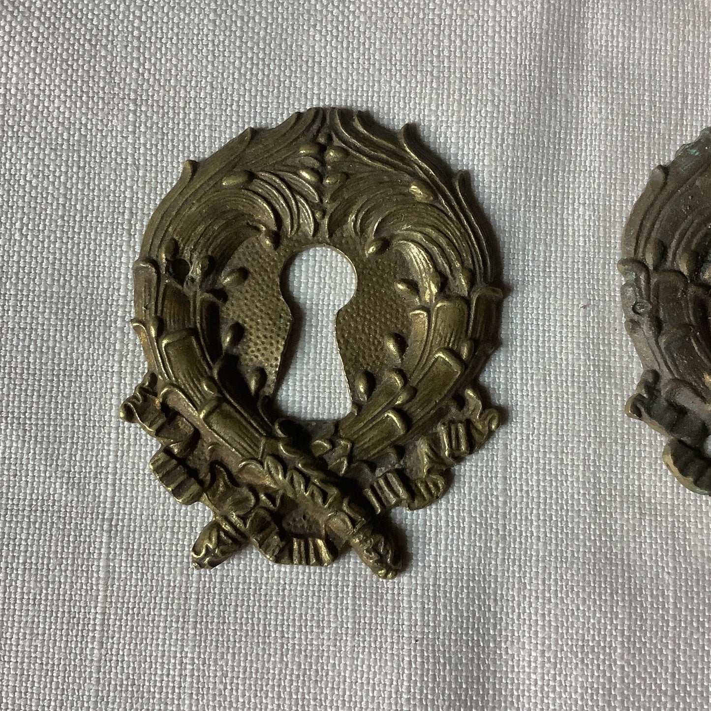 A set of Two slightly different  large  Antique Brass Keyhole Cover made in France in the 1900s