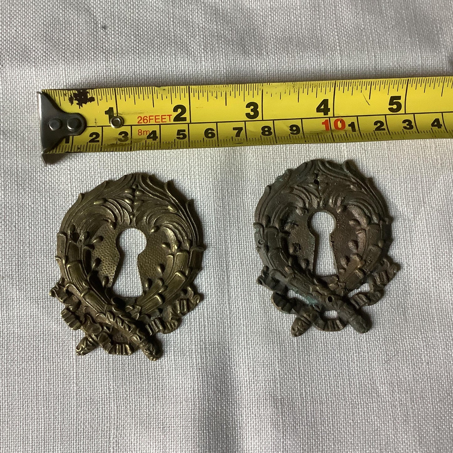 A set of Two slightly different  large  Antique Brass Keyhole Cover made in France in the 1900s