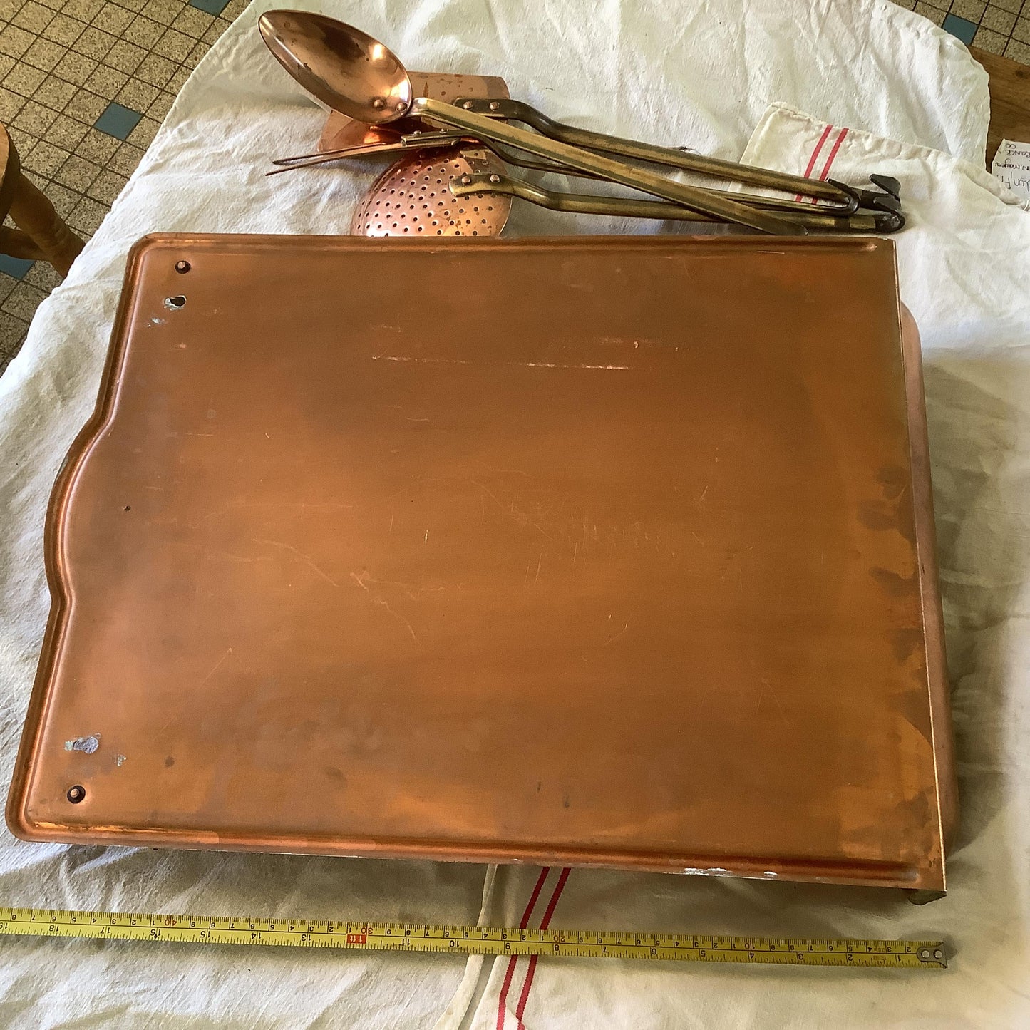 Vintage 1940s set of four copper cooking utensils, brass handles and copper rivets, display wall mounted drain stand made in France